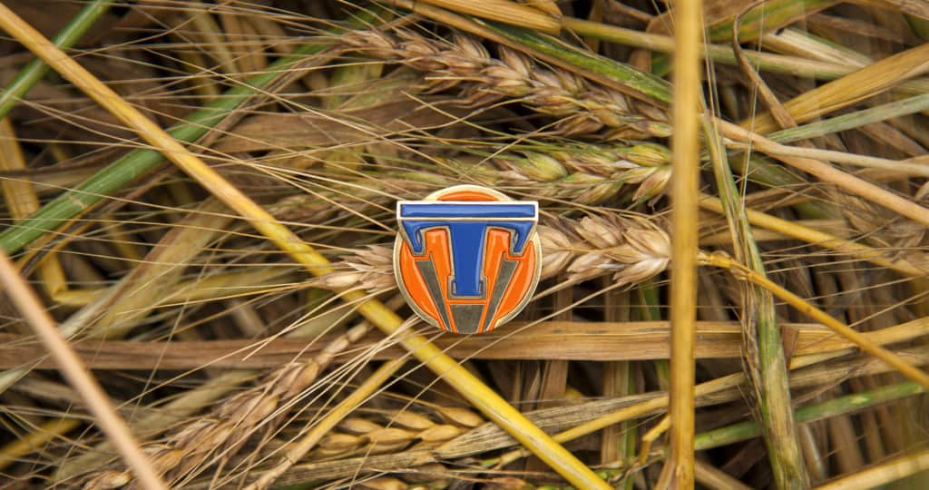 Disney's TOMORROWLAND..Tomorrowland pin ..Ph: Kimberley French..©Disney 2015